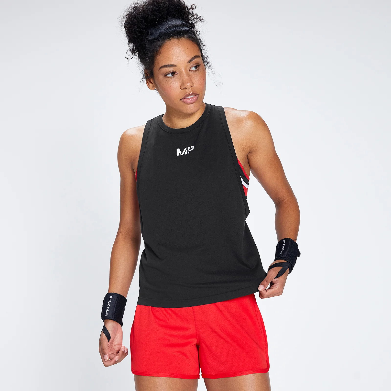 Damska lekka, bezszwowa koszulka bez rękawów z kolekcji MP Engage – czarno-biała - XS Obraz 1