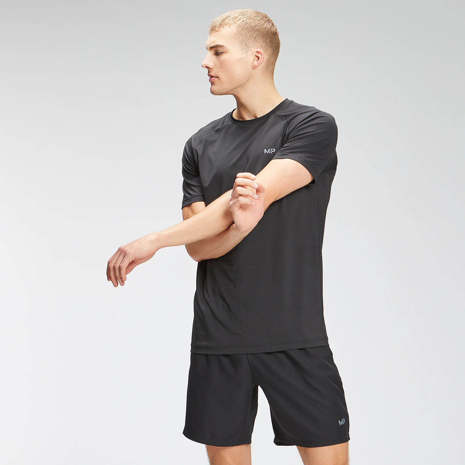 Męski T-shirt treningowy z krótkim rękawem z kolekcji Repeat Graphic MP – czarny - XS Obraz 1