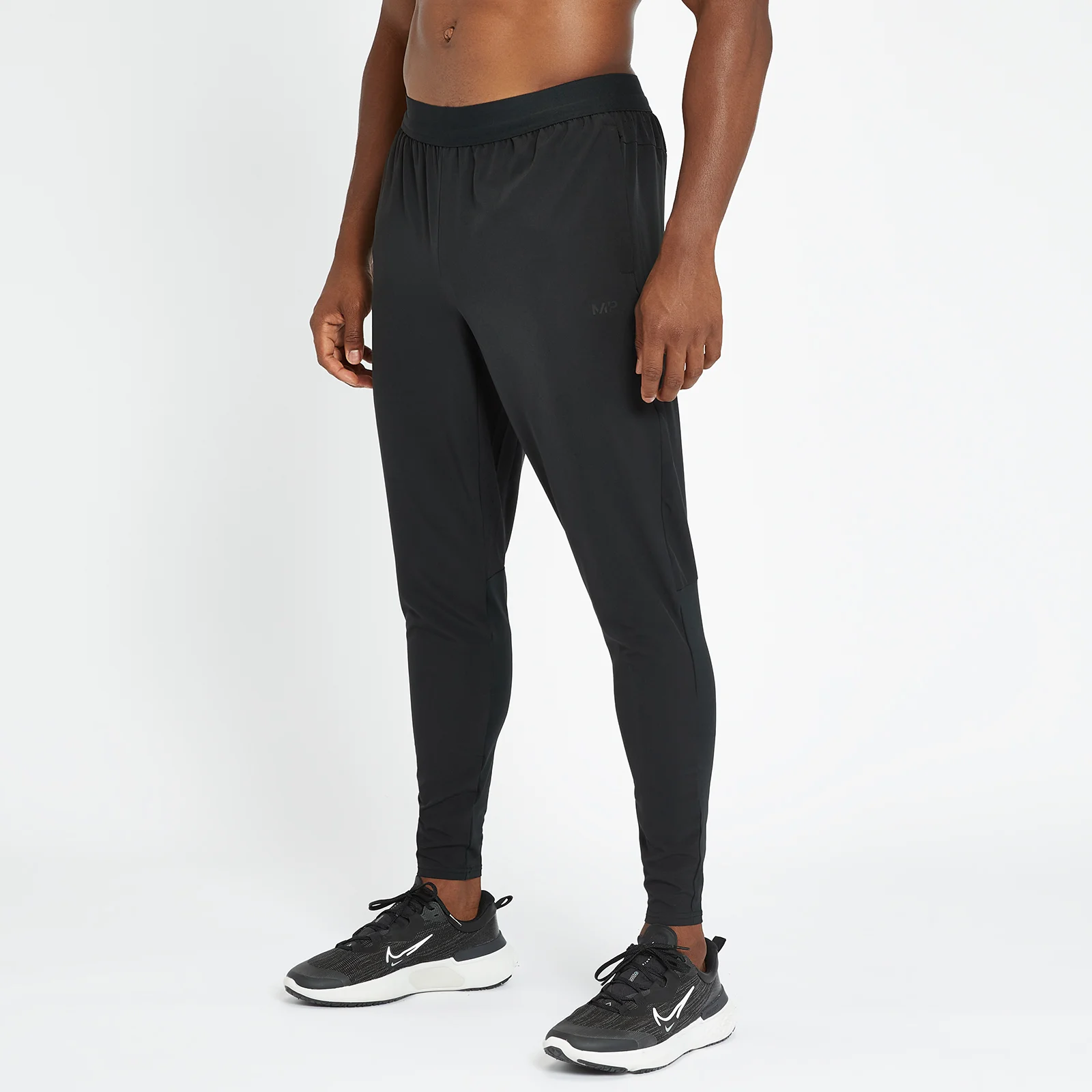 Męskie joggery z kolekcji Training Ultra MP – czarne - XS Obraz 1