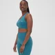 Damski bezszwowy stanik sportowy z kolekcji Composure MP – Teal Blue