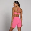Damski Biustonosz Sportowy MP Tempo Twist Back - Żywy Róż
